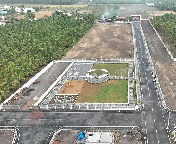 Premium plots offering planned layouts, blacktop roads, rainwater harvesting, and gated security.